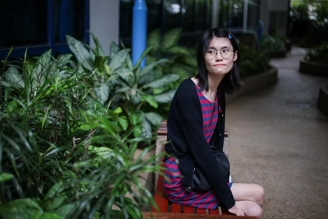 Student of visual communications at the Nanyang Academy of Fine Arts Abigail Chua, 20, inherited her rare condition from her mother. 

ST PHOTO: JASON QUAH