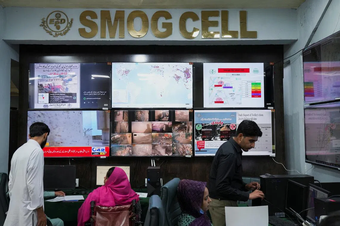 FILE PHOTO: View of monitor screens displaying the smog situation at the Smog Cell at the Environment Protection and Climate Change Department in Lahore, Pakistan November 4, 2024. REUTERS/Nida Mehboob/File Photo