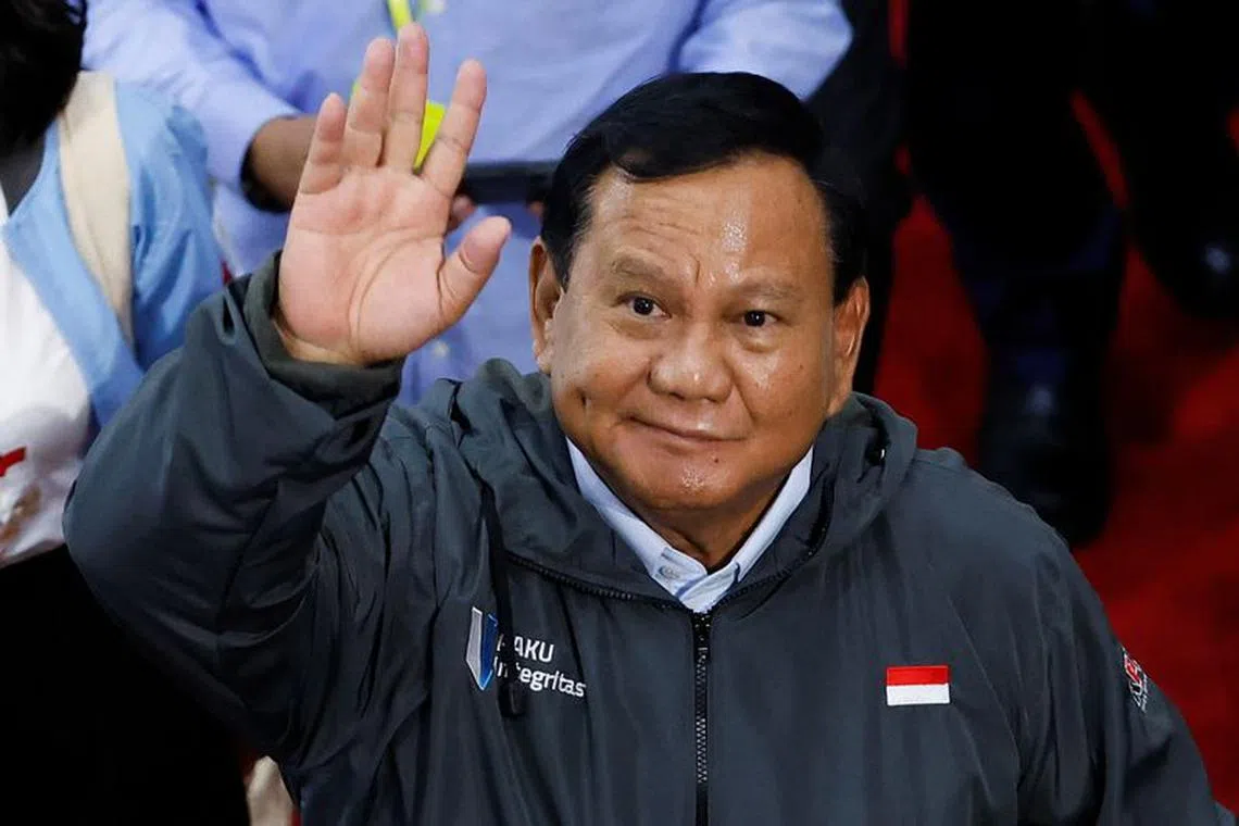 Presidential candidate Prabowo Subianto, waves to photographers as he leaves after attending a dialog held by country's anti-graft agency Corruption Eradication Commission (KPK) at its headquarters in Jakarta, Indonesia, January 17, 2024. REUTERS/Willy Kurniawan