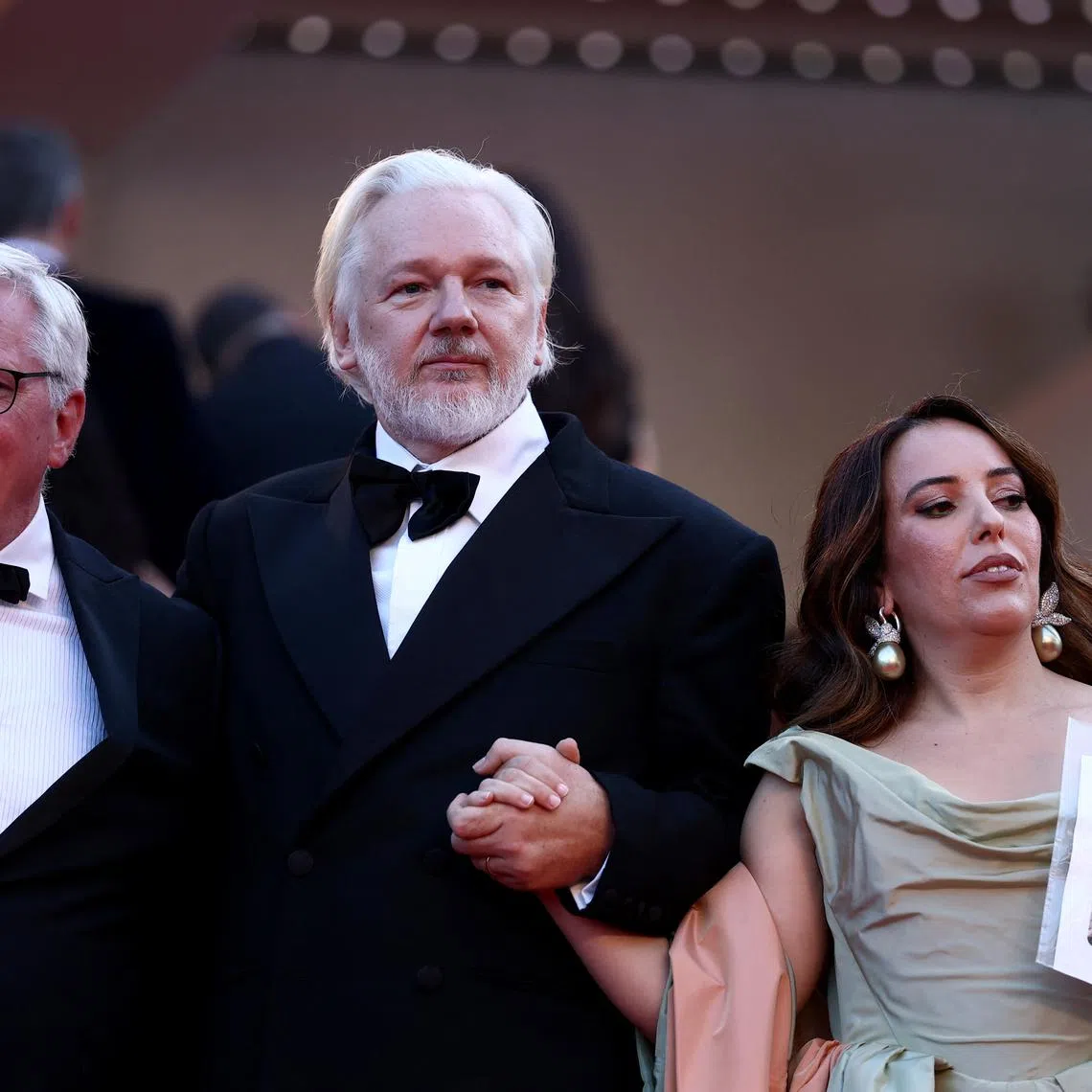 WikiLeaks founder Julian Assange, his wife Stella Assange, and the team of the documentary film \"The Six Billion Dollar Man\" presented as part of Special Screenings, pose on the red carpet during arrivals for the screening of the film \"The History of Sound\" in competition at the 78th Cannes Film Festival in Cannes, France, May 21, 2025. REUTERS/Sarah Meyssonnier