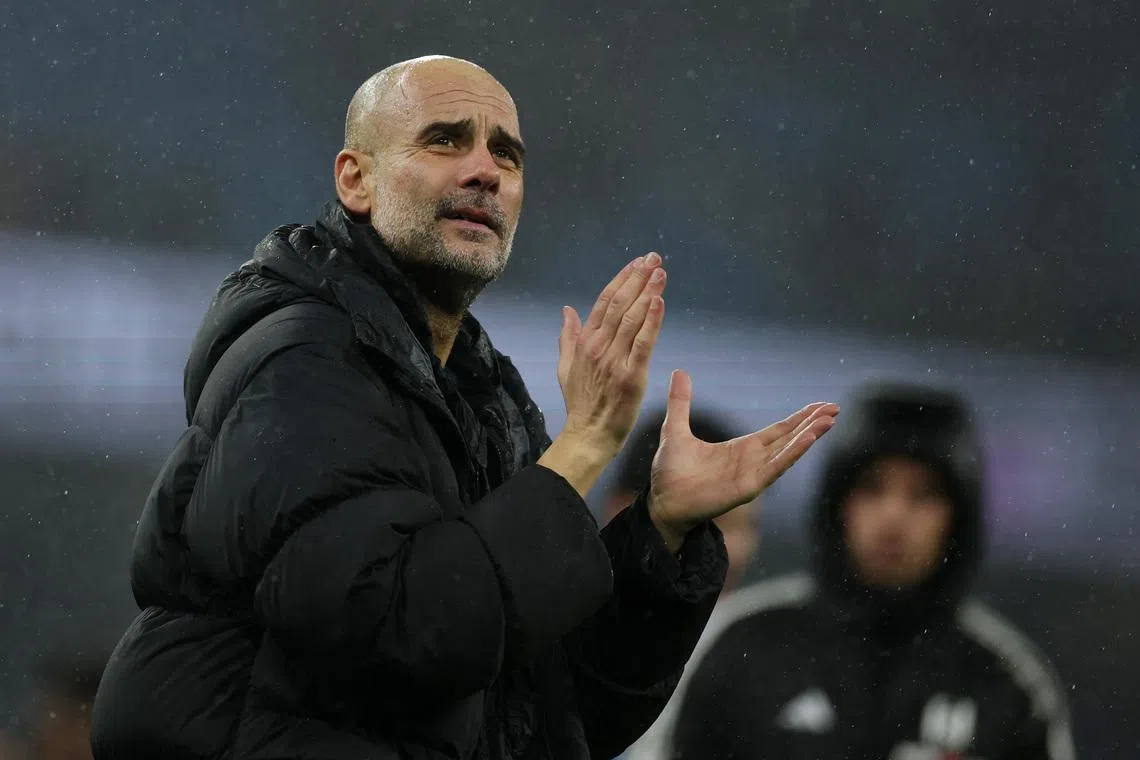 Soccer Football - Premier League - Manchester City v Fulham - Etihad Stadium, Manchester, Britain - February 11, 2026 Manchester City manager Pep Guardiola applauds fans after the match REUTERS/Phil Noble
