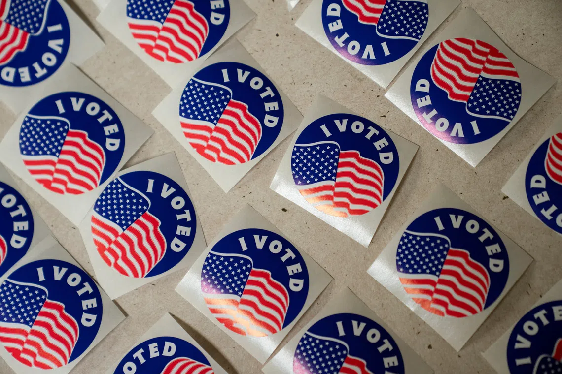 Stickers are lined on a table for voters at the American Legion Post 53 polling location during the Wisconsin Supreme Court election in Eau Claire, Wisconsin, U.S., April 1, 2025.  REUTERS/Erica Dischino/File Photo