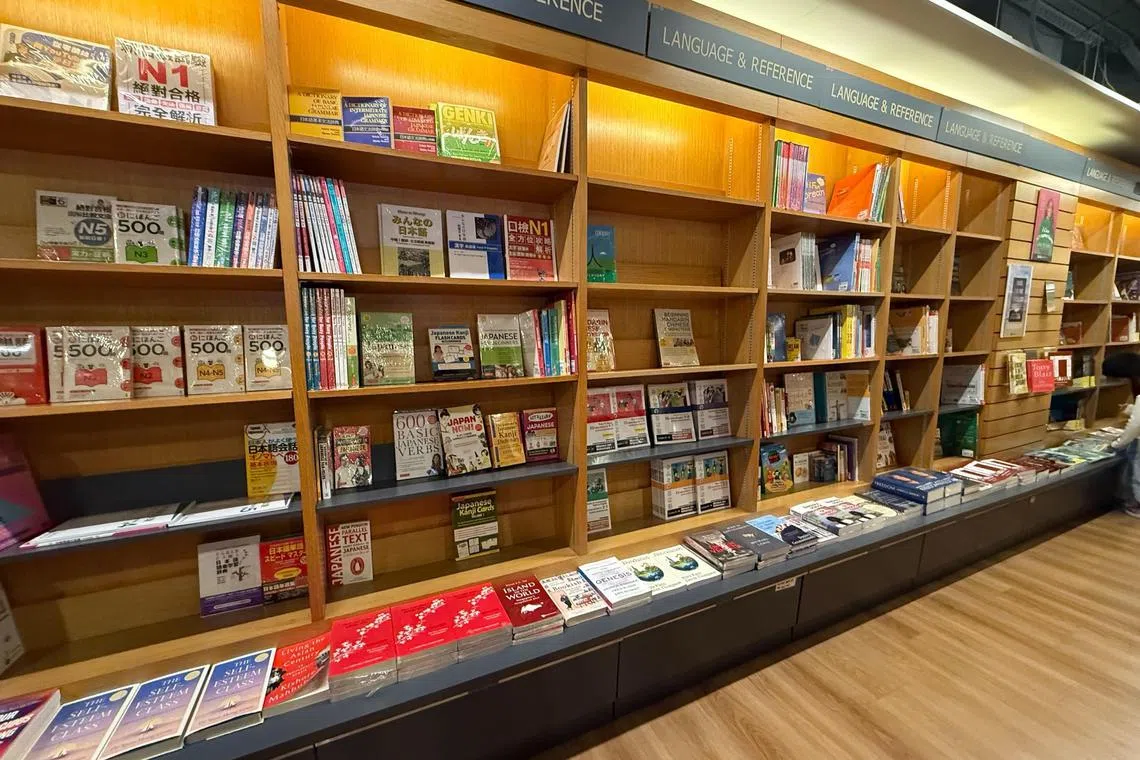 Shelves half emptied at Kinokuniya in Bugis Junction.