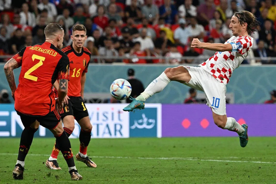 Croatia midfielder Luka Modric controlling the ball during 0-0 draw with Belgium in a Group F match on Dec 1.