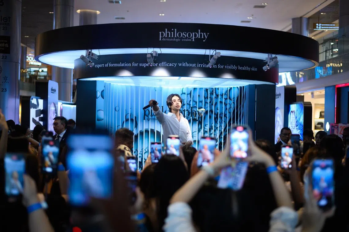 Thai singer-songwriter Jeff Satur, Philosophy SEA Ambassador, performing at the skincare brand's October pop-up.