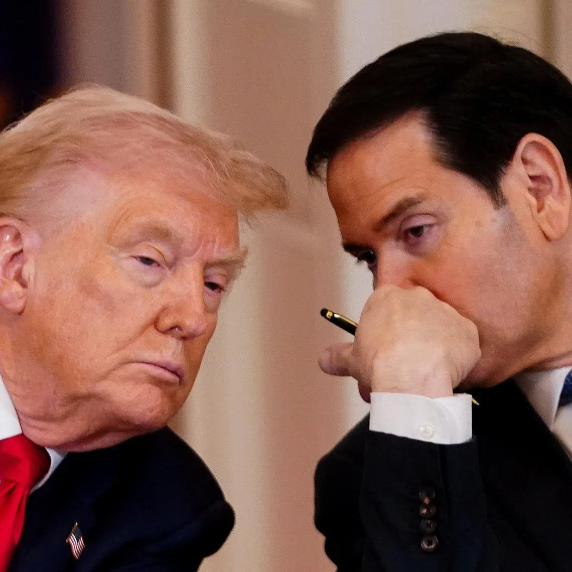 U.S. President Donald Trump listens to U.S. Secretary of State Marco Rubio during a round table in the White House in Washington, D.C., March 6, 2026. REUTERS/Nathan Howard