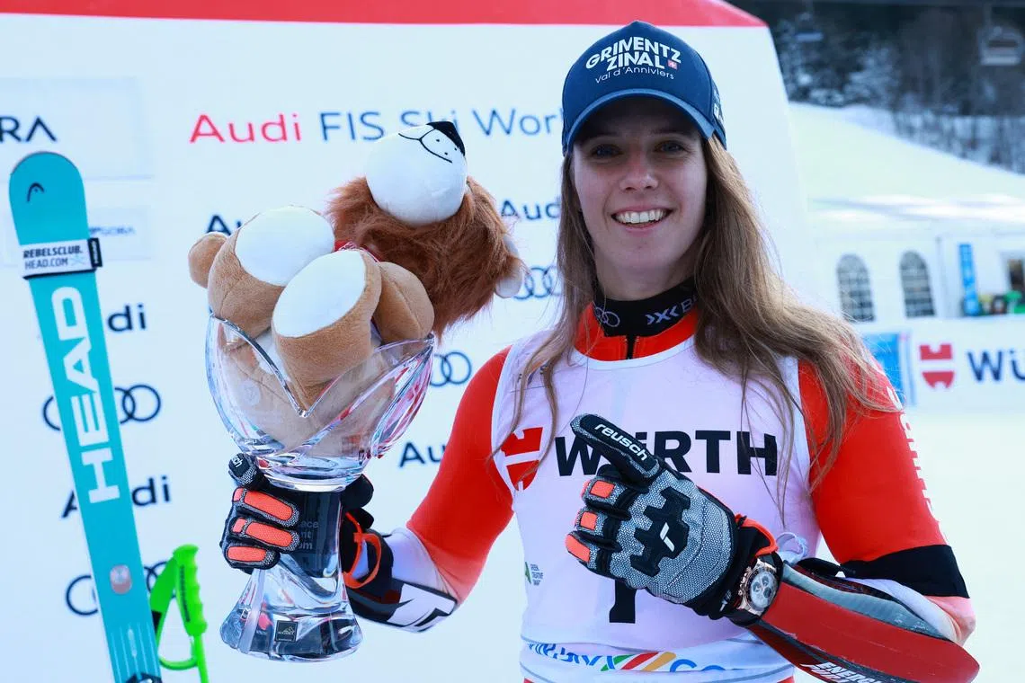 Alpine Skiing - FIS Alpine Ski World Cup - Women's Giant Slalom - Kranjska Gora, Slovenia - January 3, 2026 Switzerland's Camille Rast poses for a picture with her trophy after winning the women's giant slalom REUTERS/Borut Zivulovic