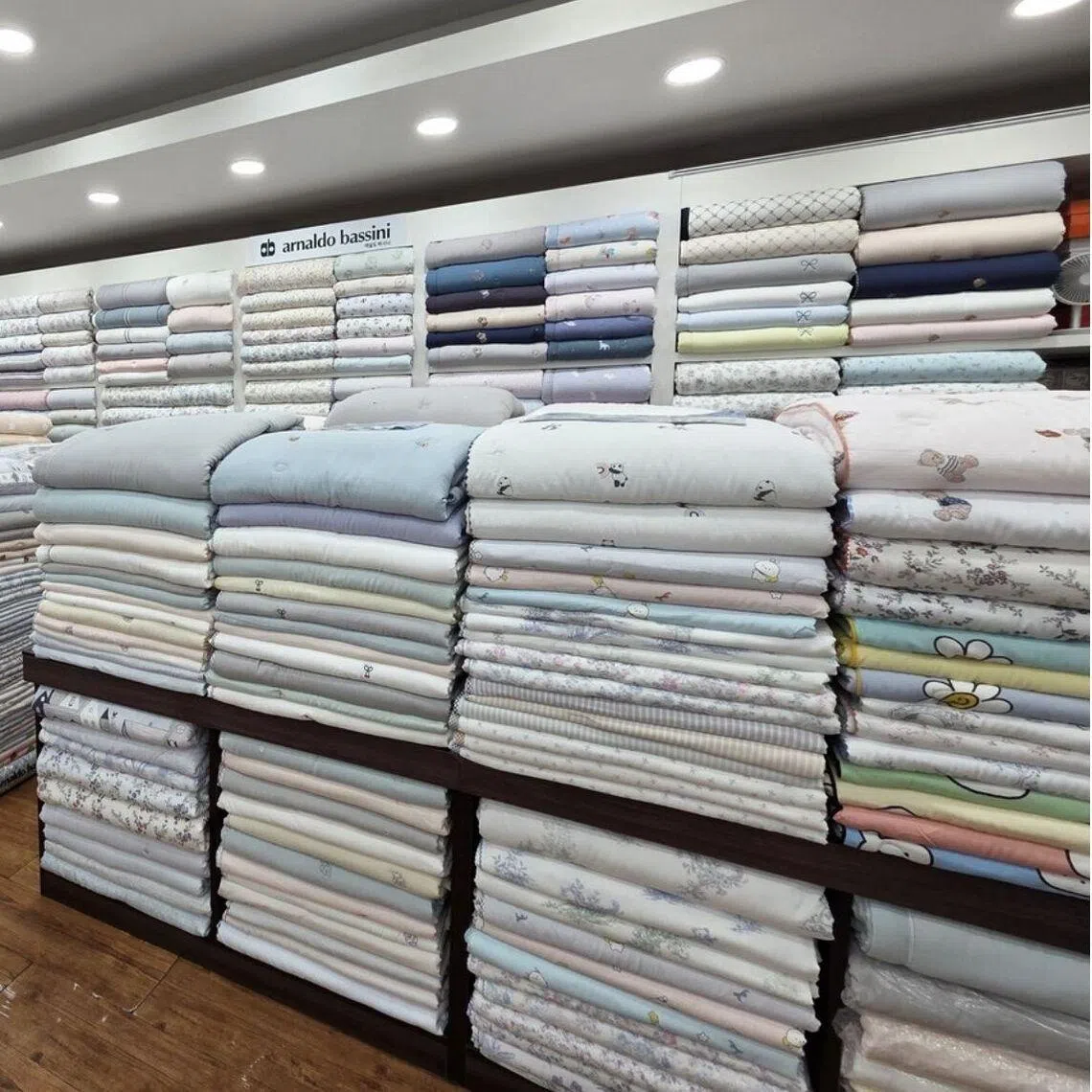 A stack of blankets at Gwangjang Market in Seoul, South Korea. Store owners say most of their customers are foreigners these days.