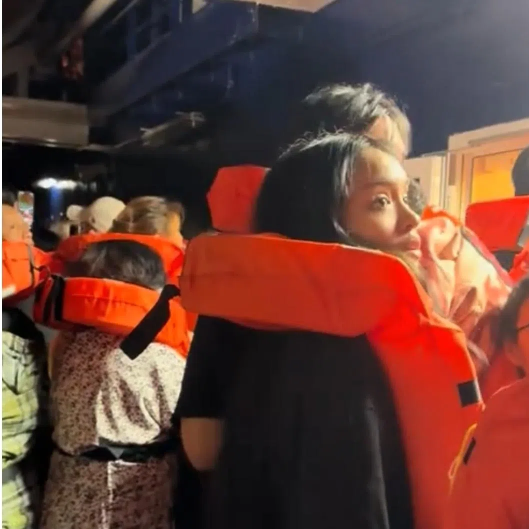 A video uploaded on Tiktok shows passengers wearing life vests gathered at one of the decks.