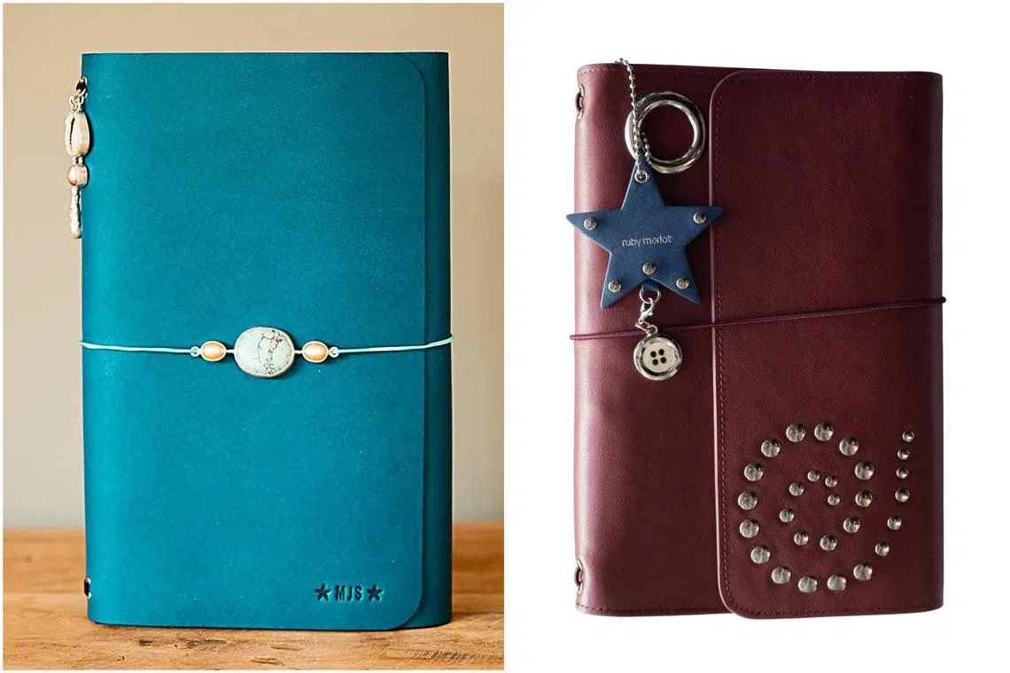 Louise Carmen's Honore Notebook, and Ruby Merlot's Orbit Journal.