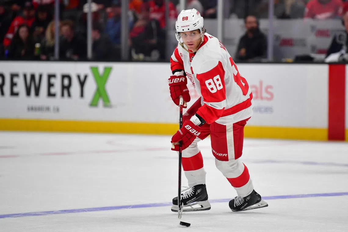 FILE PHOTO: Nov 15, 2024; Anaheim, California, USA; Detroit Red Wings right wing Patrick Kane (88) moves the puck against the Anaheim Ducks during the third period at Honda Center. Gary A. Vasquez-Imagn Images/File Photo