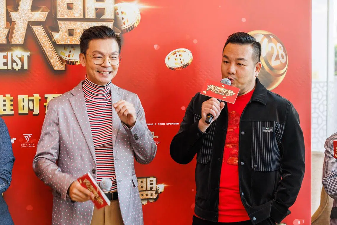 Actors Mark Lee (left) and Jack Lim at the press event for the caper comedy What! The Heist.