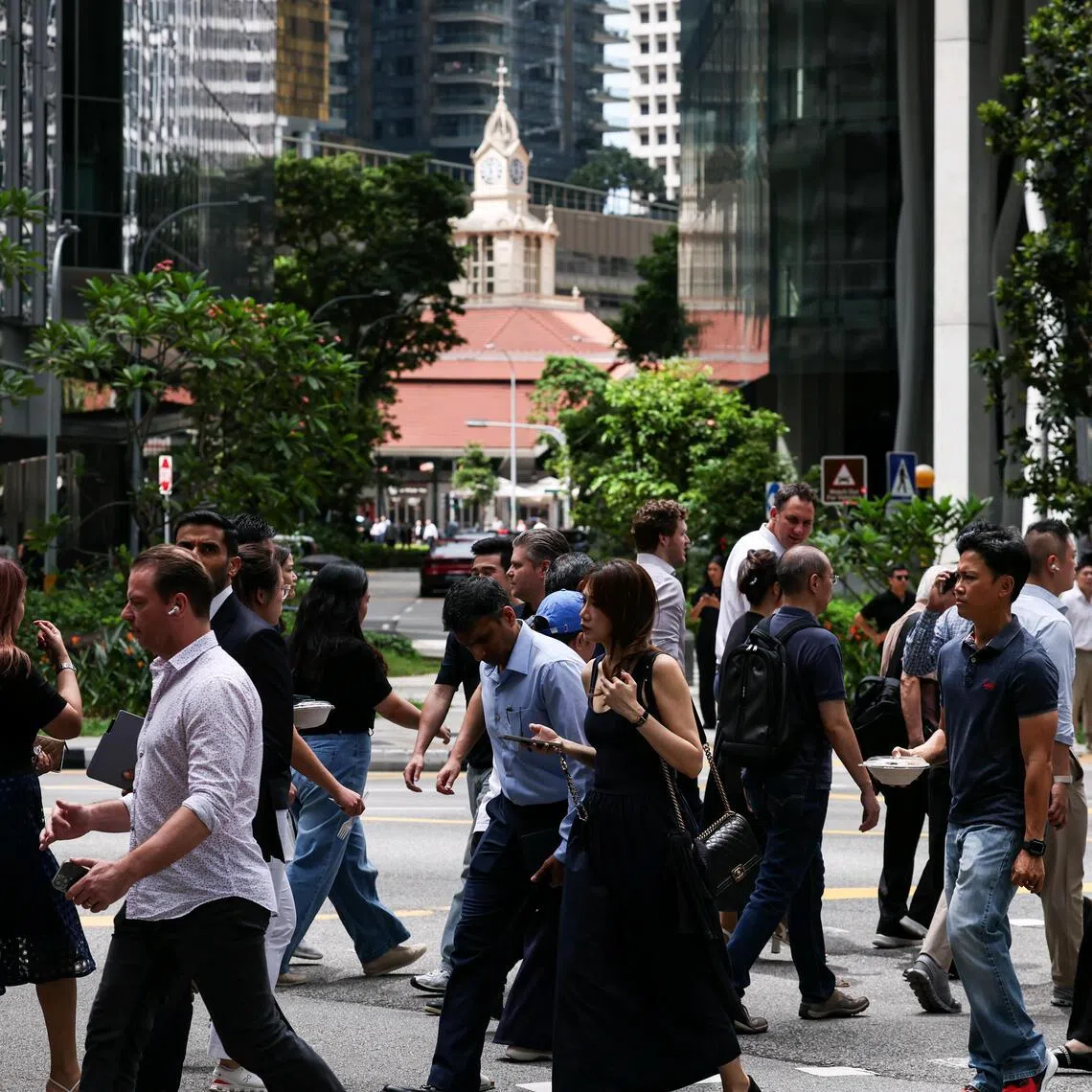 Generic of office workers at Raffles Place on May 12, 2026. Can be used for stories on Economic Strategy Review (ESR), economy, workers, workforce. ST PHOTO: BRIAN TEO