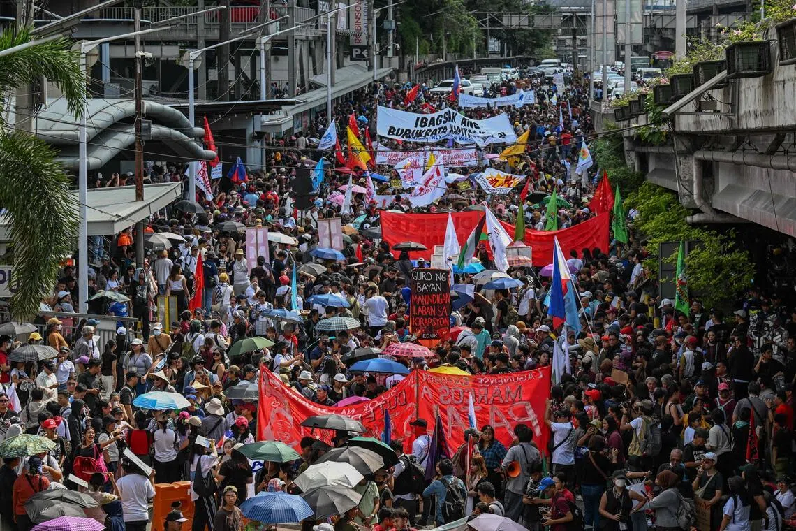 Filipinos protest against corruption on anniversary of Marcos Sr’s ouster