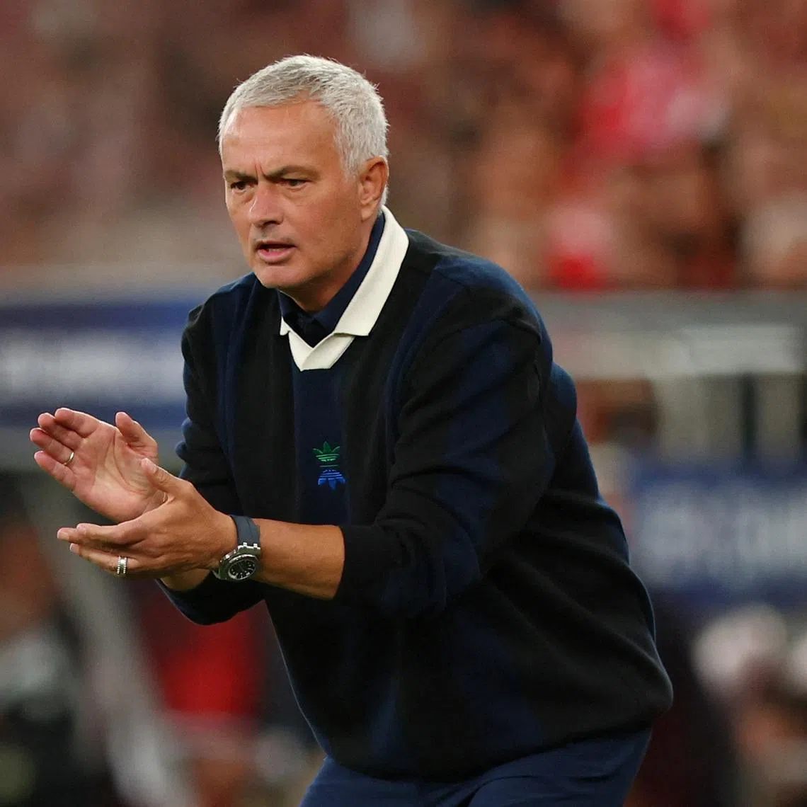 FILE PHOTO: Soccer Football - UEFA Champions League - Play Off - Second Leg - Benfica v Fenerbahce - Estadio da Luz, Lisbon, Portugal - August 27, 2025 Fenerbahce coach Jose Mourinho reacts REUTERS/Pedro Nunes/File Photo