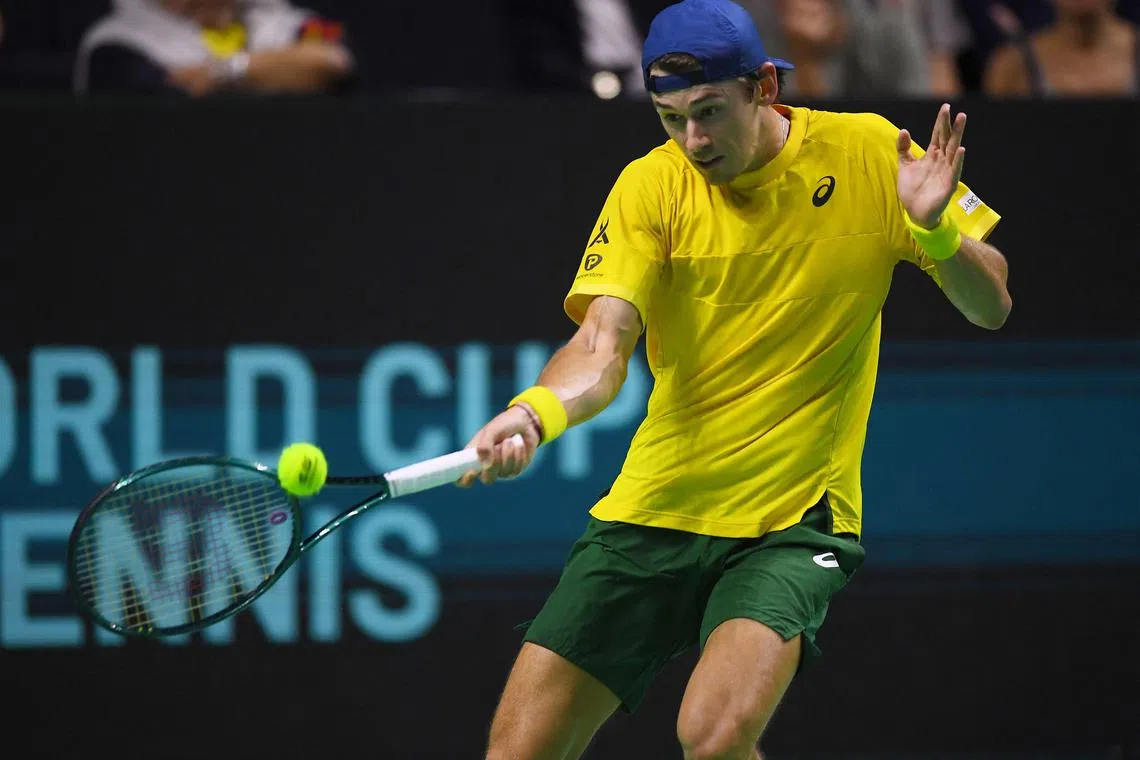 Alex de Minaur of Team Australia returning a shot to Jannik Sinner of Team Italy during their semi-final singles match at the Davis Cup Finals at the Palacio de Deportes Jose Maria Martin Carpena arena in Malaga, southern Spain, on Nov 23.
