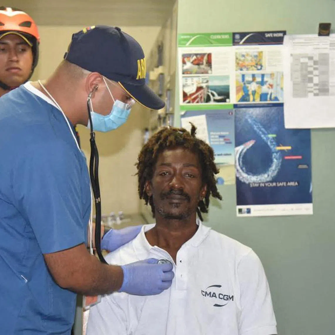 Elvis Francois is checked by a doctor after being lost at sea for almost a month.