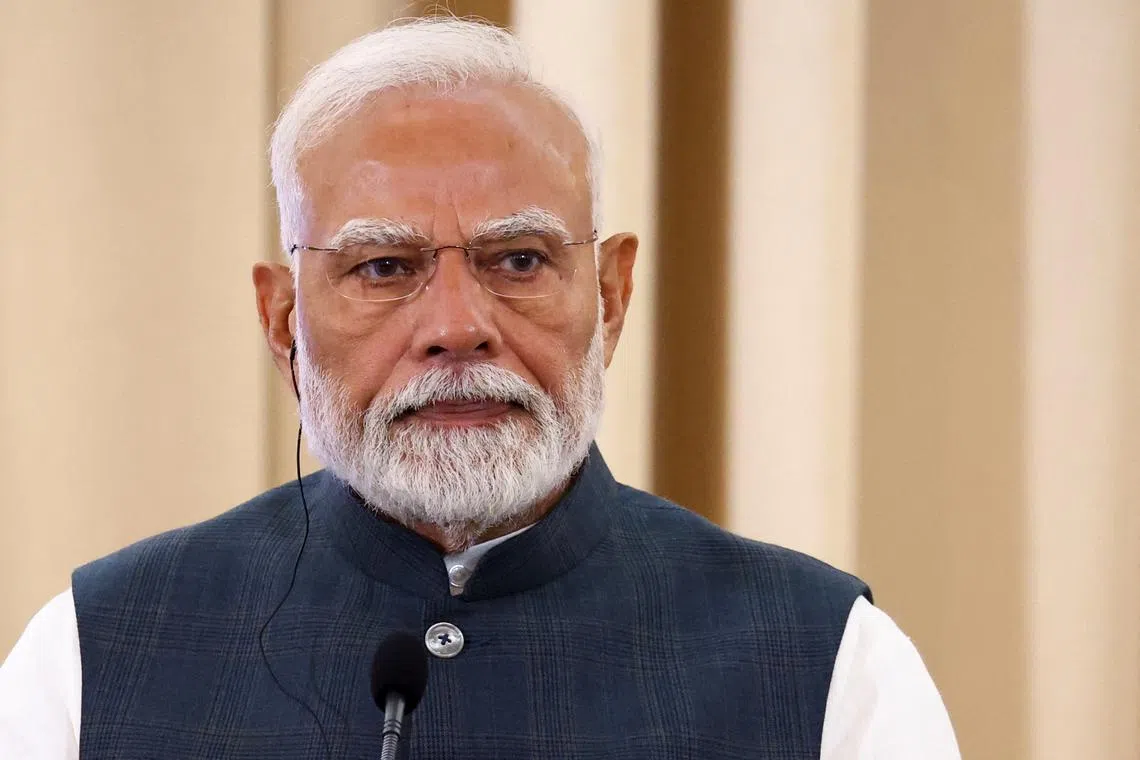 FILE PHOTO: India's Prime Minister Narendra Modi attends a press conference with Thailand's Prime Minister Paetongtarn Shinawatra at the Government House, in Bangkok, Thailand, April 3, 2025. REUTERS/Athit Perawongmetha/File Photo