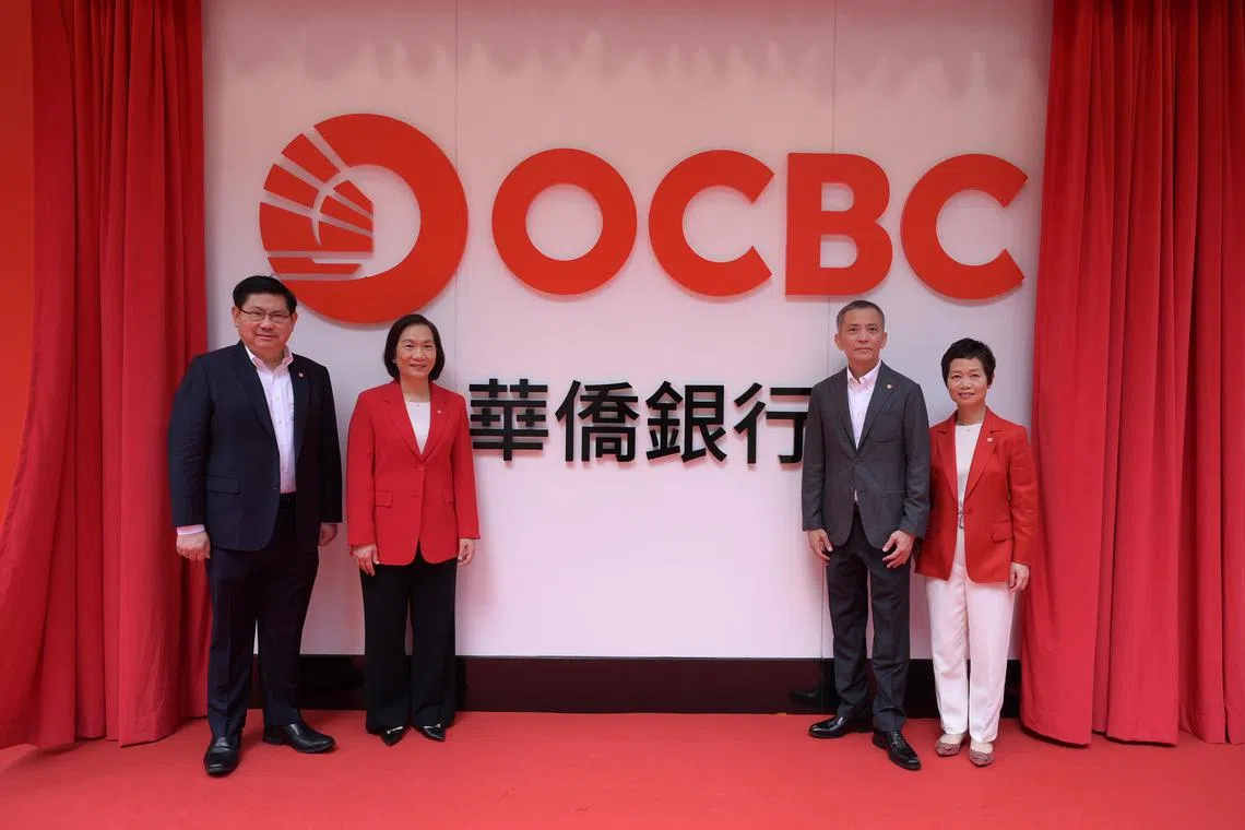 The bank's refreshed logo was unveiled at the OCBC Centre Hong Kong on Monday by (from left) Mr Tan Wing Ming, OCBC's acting head of Greater China; Ms Helen Wong, the bank's group chief executive; Dr Andrew Khoo, board chairman at OCBC Hong Kong; and Ms Ivy Au-Yeung, chief executive of OCBC Hong Kong. 