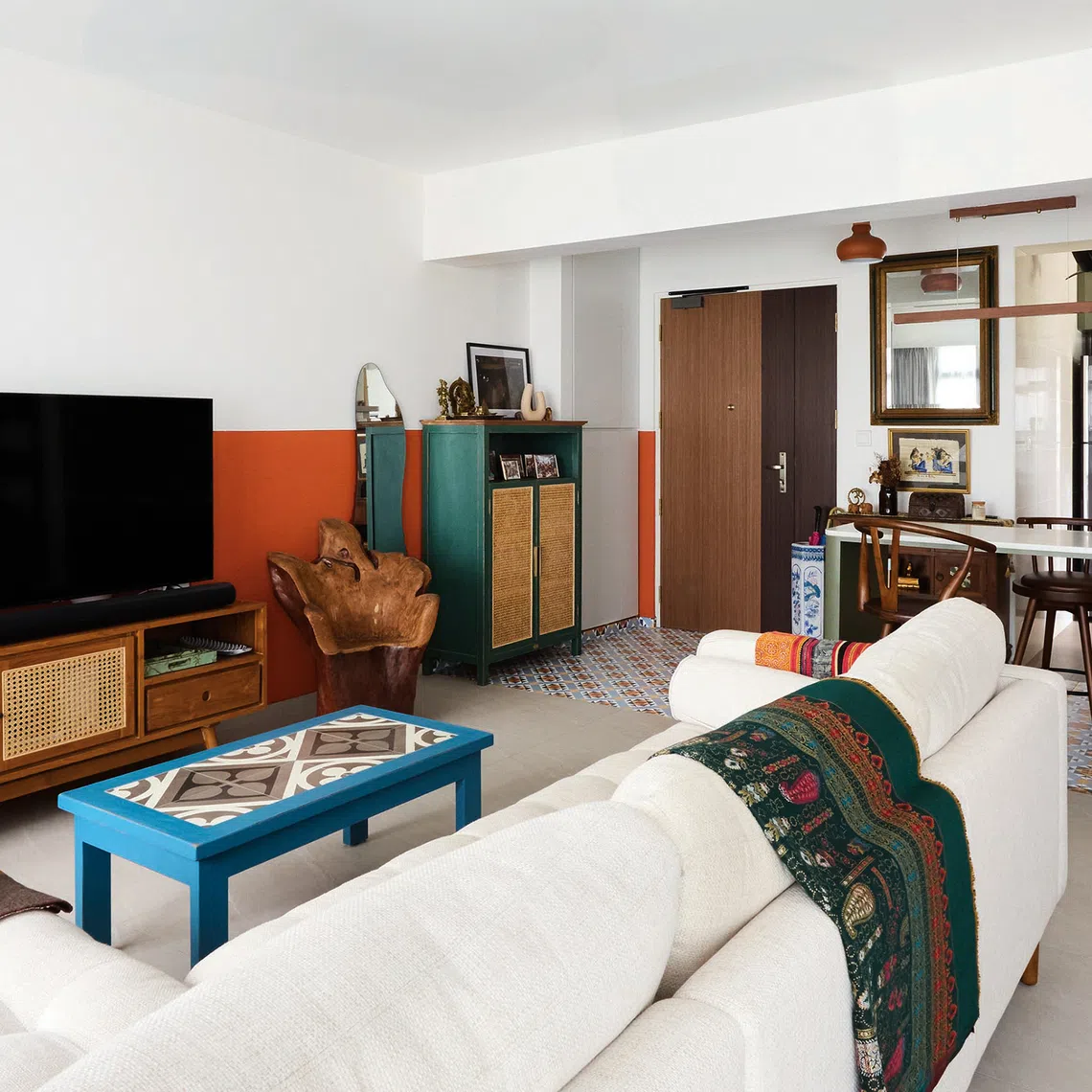 This funky flat has tropical touches throughout the decor.