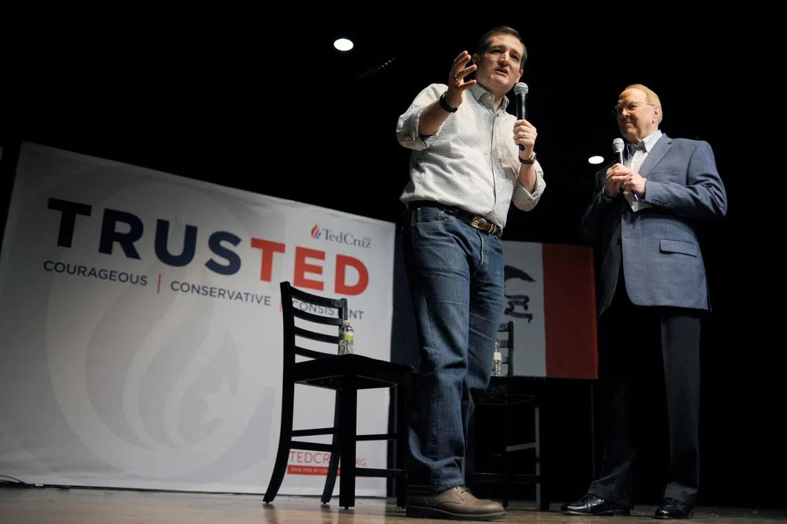 FILE PHOTO: Ted Cruz speaks with Dr. James Dobson (R), an evangelical Christian author, at a town hall at Winterset Stage in Winterset, Iowa January 4, 2016. REUTERS/Mark Kauzlarich/File Photo