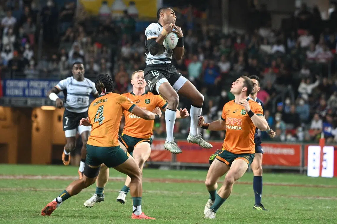 Fiji’s Vuiviawa Naduvalo taking a high ball in the Cup final against Australia at the Hong Kong Sevens rugby tournament on Sunday. Australia won 20-17.