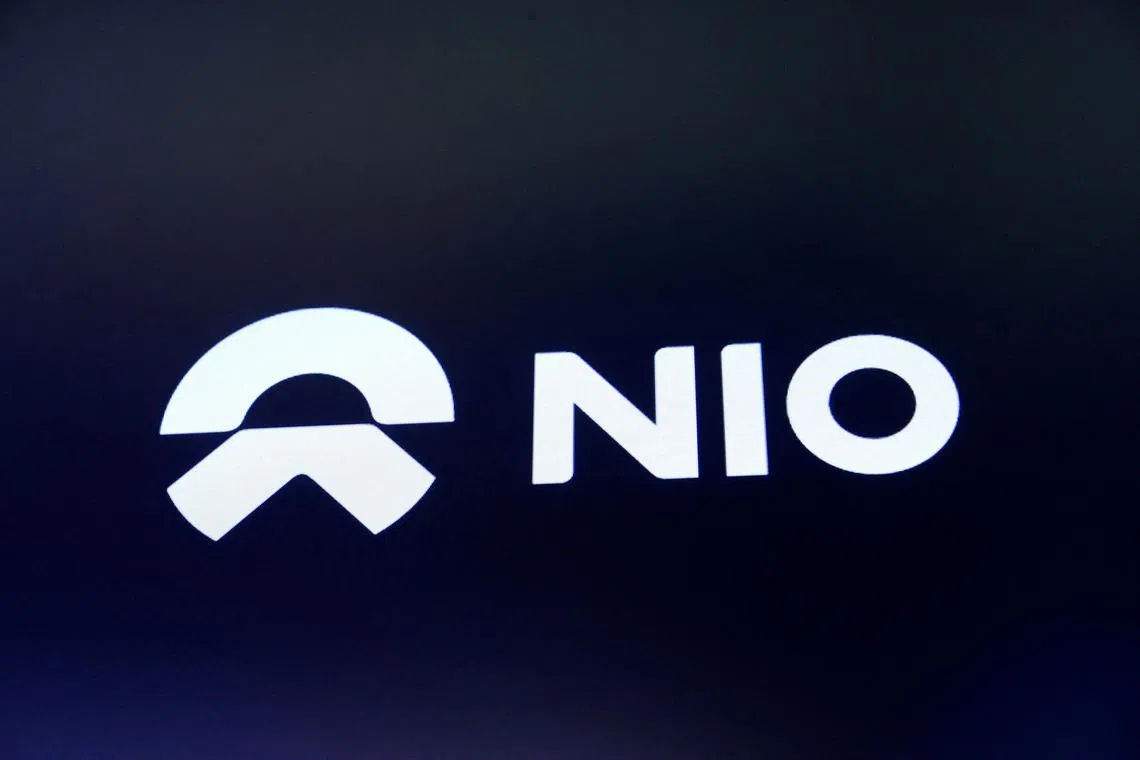 FILE PHOTO: Chinese electric vehicle start-up Nio Inc. company logo is on display on its initial public offering (IPO) day at the NYSE in New York, U.S., September 12, 2018.  REUTERS/Brendan McDermid/File Photo