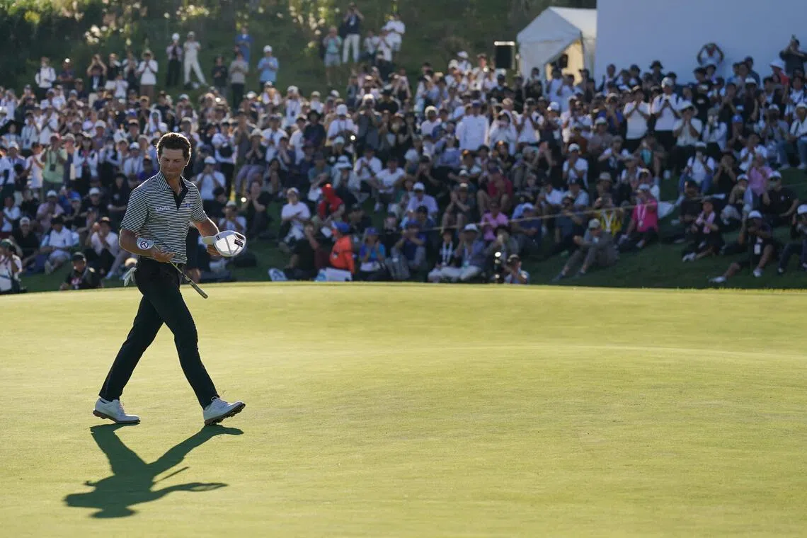 Michael Brennan on the 18th green after winning the final round of the PGA Tour Baycurrent Classic golf tournament in Yokohama on Oct 11.