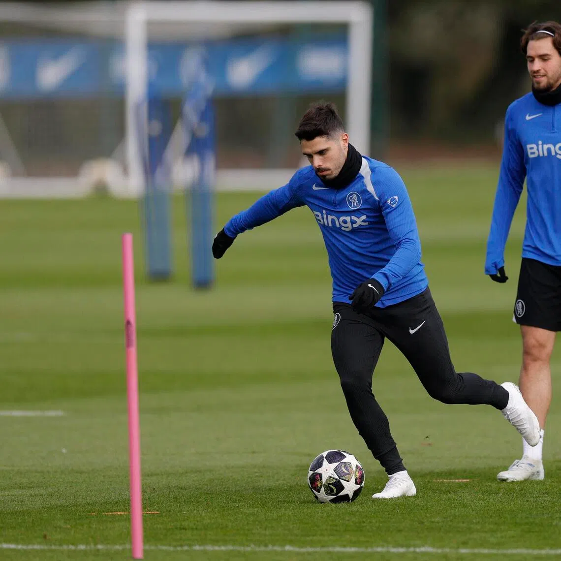 Chelsea's Pedro Neto (left) during training with Marc Guiu on March 16. Neto is free to play against PSG in the Champions League round of 16, second leg on March 17.