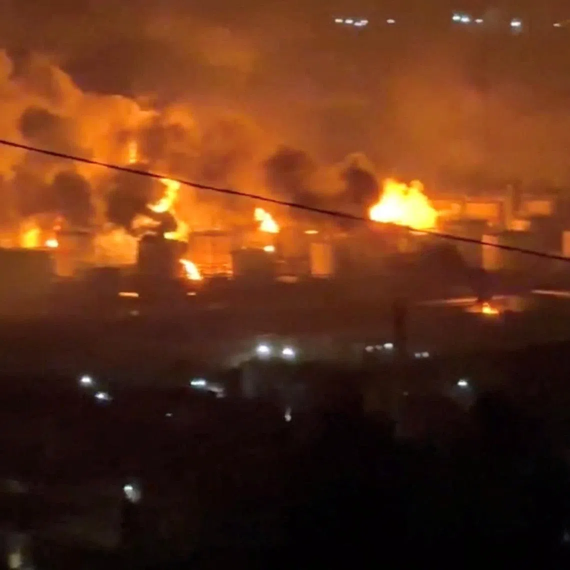 Fire and smoke rise at the Tuapse oil refinery near the Tuapse port, following a Ukrainian drone attack, according to Russian officials, in Tuapse, Krasnodar Krai, Russia, in this screengrab obtained from a social media video released on April 20, 2026. SOCIAL MEDIA/via REUTERS