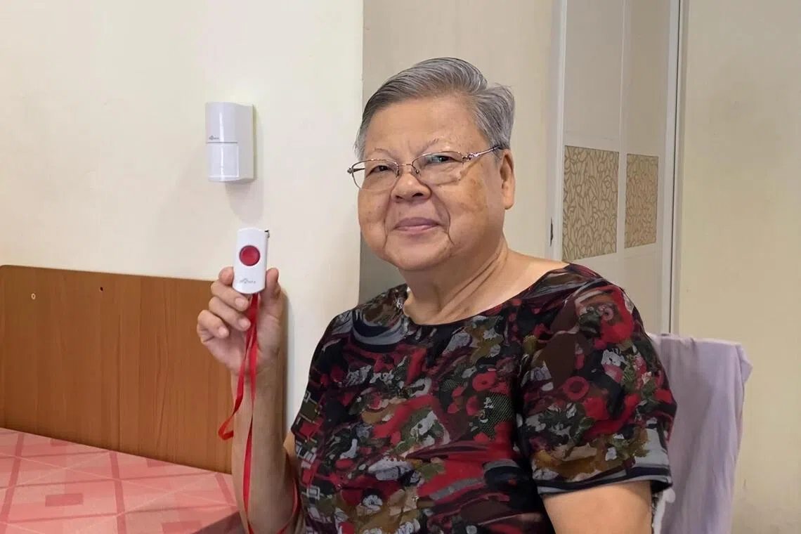 Madam Ng Ban Wee, 72, a beneficiary of the Singapore Red Cross who lives alone, will be getting the new 3D motion detector.