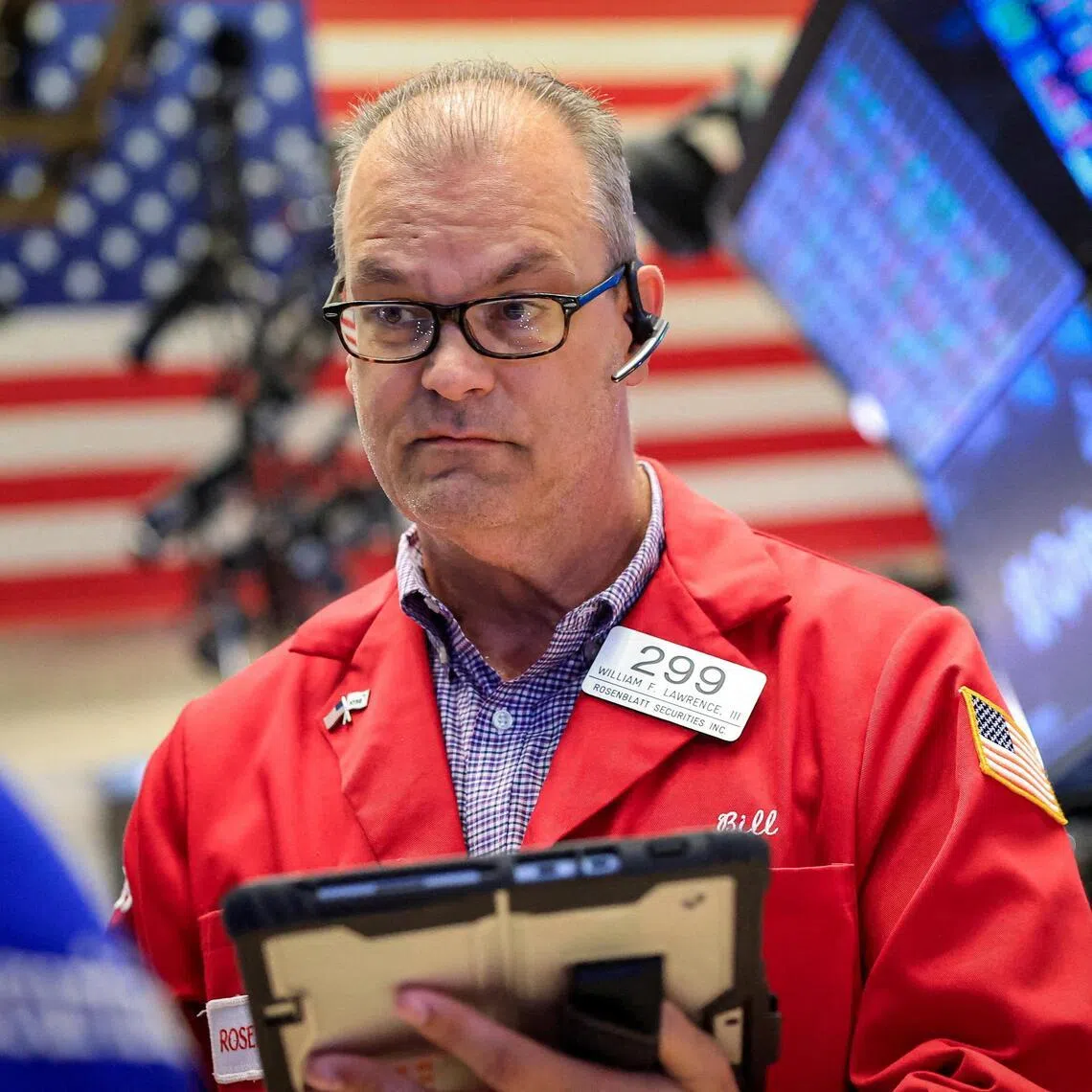 Traders working on the floor of the New York Stock Exchange, in New York City, on June 22.  