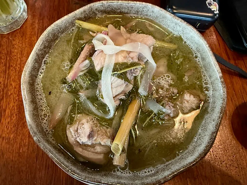 Ayam Pansoh, a Sarawak traditional dish made by cooking marinated chicken inside a bamboo stalk served at Kantin at the Granary, a bustling eatery in Kuching, Sarawak on Aug 14.