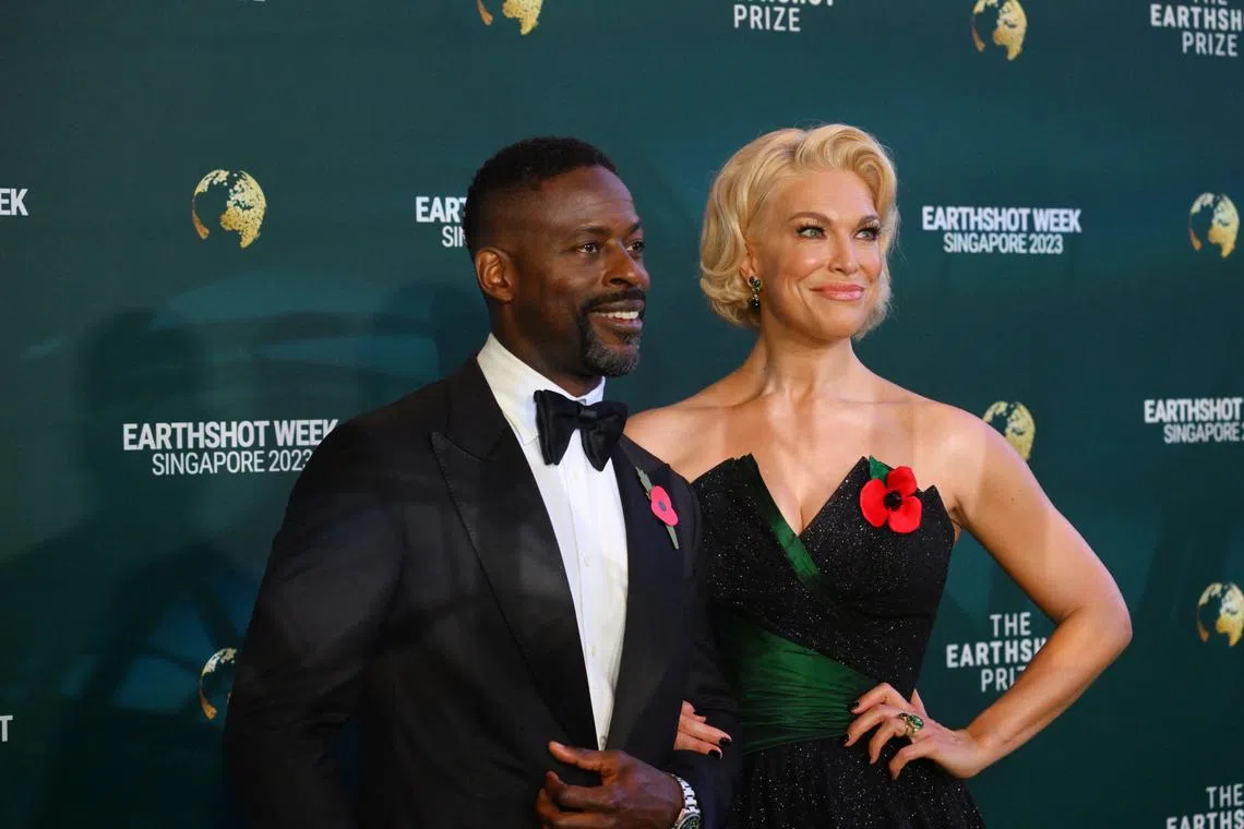 British actress Hannah Waddingham (right) and US actor Sterling K. Brown posing on the green carpet ahead of the Earthshot Prize Awards ceremony at Mediacorp Campus on Nov 7, 2023.