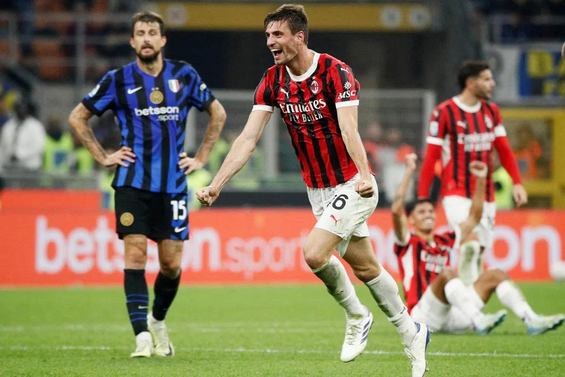 AC Milan's Matteo Gabbia celebrates after the 2-1 Italian Serie A win over Inter Milan.