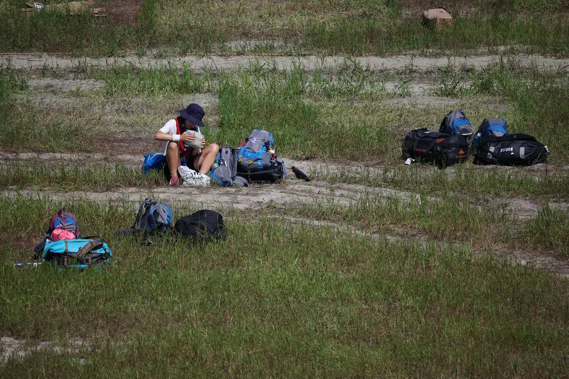FILE PHOTO: A participant prepares to leave the camping site of the 25th World Scout Jamboree in Buan, South Korea, August 8, 2023.   REUTERS/Kim Hong-Ji/File Photo