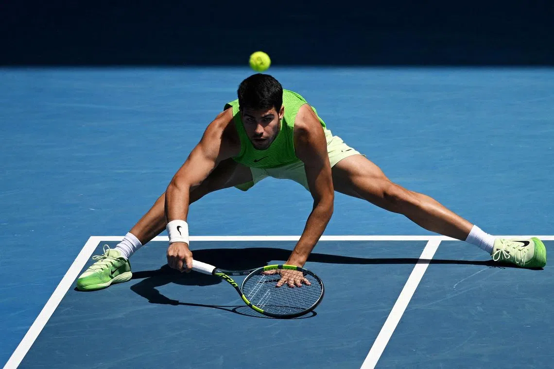 Tennis - Australian Open - Melbourne Park, Melbourne, Australia - January 25, 2026 Spain's Carlos Alcaraz in action during his fourth round match against Tommy Paul of the U.S. REUTERS/Jaimi Joy