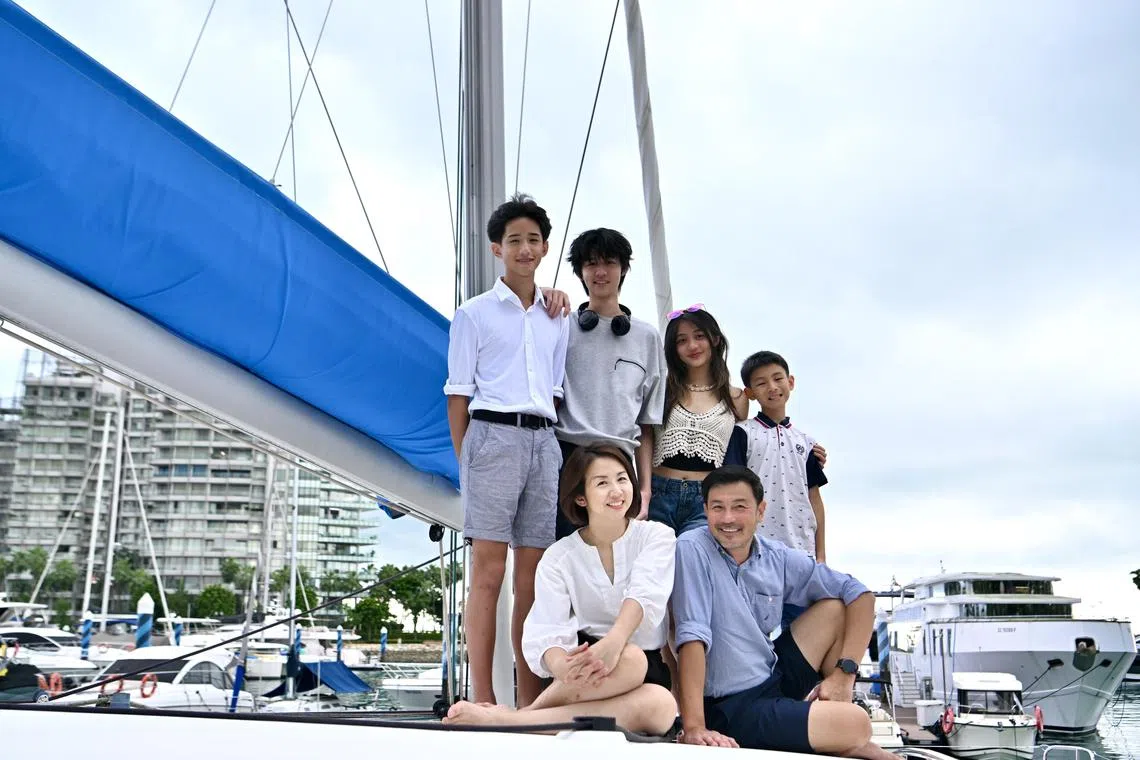 TV personalities Evelyn Tan and Darren Lim are celebrating their 20th wedding anniversary in 2024. They are seen here with their four children (standing, from left) Way, Jairus, Kristen and Elliot.