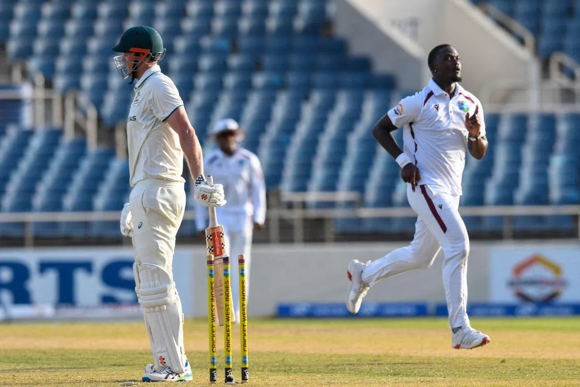 Australia's Cameron Green is bowled by West Indies' Jayden Seales on the first day of the 3rd cricket Test at Sabina Park, Kingston, Jamaica on July 12, 2025. He is 42 not out in the second innings.
