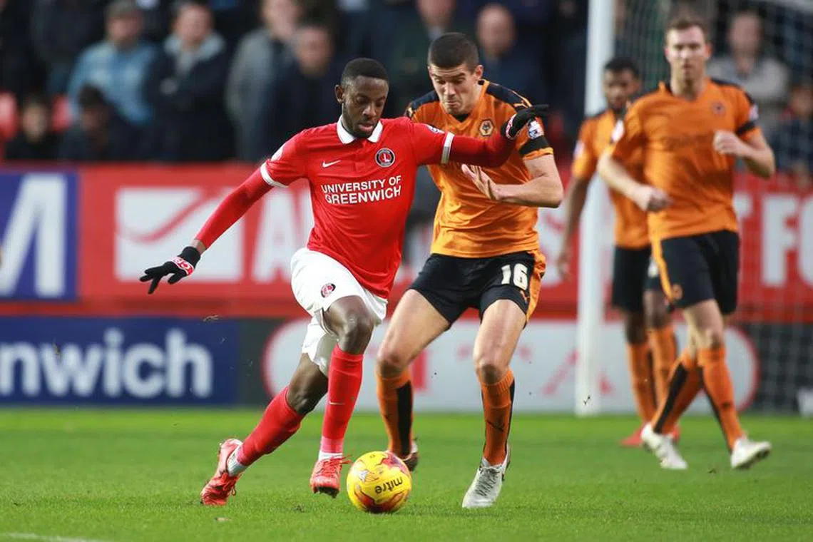 Football Soccer - Charlton Athletic v Wolverhampton Wanderers - Sky Bet Football League Championship - The Valley - 28/12/15 
Charlton Athletic's El Hadji Ba in action with Wolverhampton Wanderers' Conor Coady /Action Images / John Marsh/File Photo