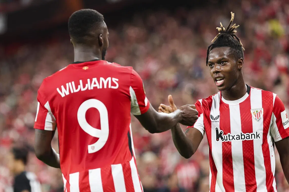 Athletic Bilbao's Nico Williams (right) and brother Inaki Williams embody a multicultural Spain, having been born in the country to Ghanaian parents.