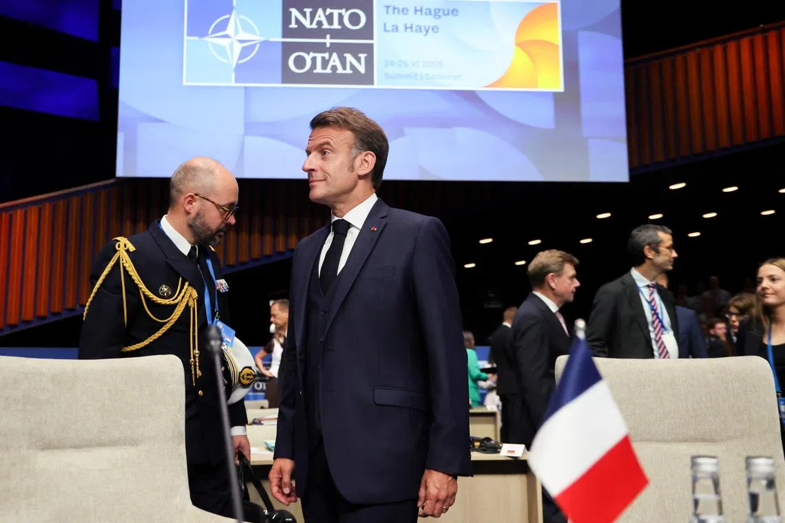 France's President Emmanuel Macron looks on at the start of a NATO leaders summit in The Hague, Netherlands June 25, 2025. LUDOVIC MARIN/Pool via REUTERS