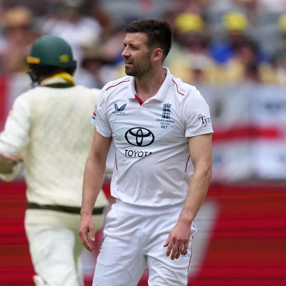 Cricket - The Ashes - Australia v England - First Test - Perth Stadium, Perth, Australia - November 22, 2025 England's Mark Wood reacts REUTERS/Asanka Brendon Ratnayake
