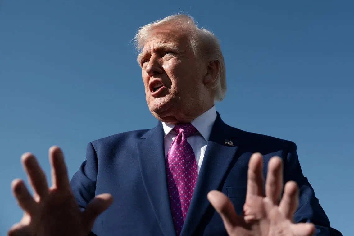 U.S. President Donald Trump speaks to the media, before boarding Air Force One on his way to Virginia, at Joint Base Andrews in Maryland, U.S., April 10, 2026. REUTERS/Evelyn Hockstein