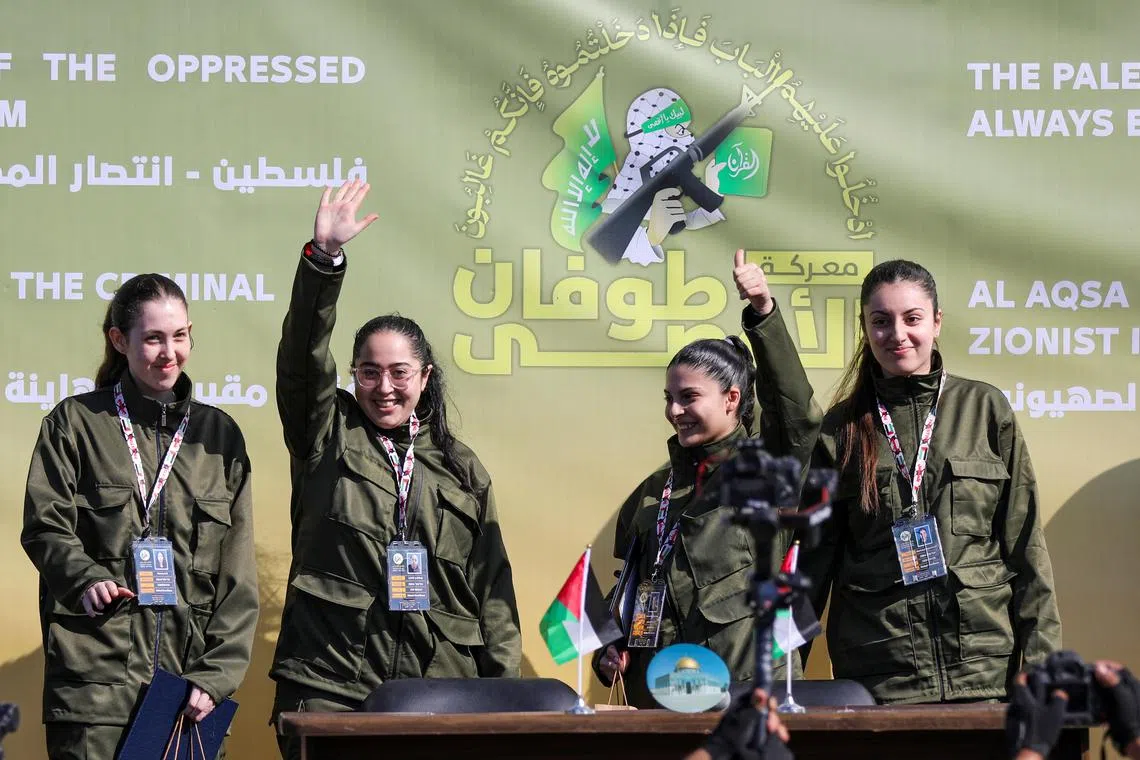 Four female Israeli soldiers, who had been held in Gaza since the deadly October 7, 2023 attack, are released by Hamas militants as part of a ceasefire and a hostages-prisoners swap deal between Hamas and Israel, in Gaza City, January 25, 2025. REUTERS/Dawoud Abu Alkas