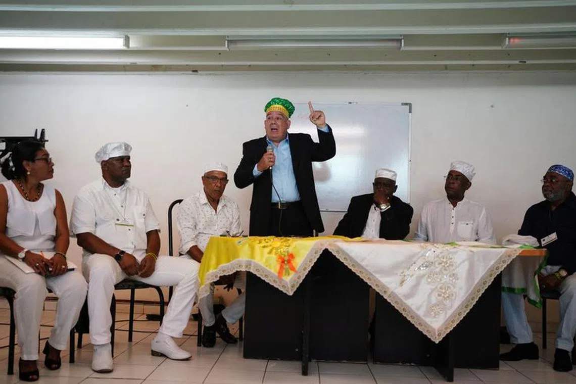 A follower of the Yoruba religion Randell Montero speaks during a news conference in Havana, Cuba, January 2, 2023. REUTERS/Alexandre Meneghini