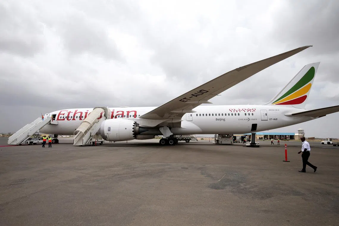 FILE PHOTO: An Ethiopian Airlines Boeing 787-9 Dreamliner plane is seen at the Asmara International Airport in Asmara, Eritrea July 18, 2018. REUTERS/Tiksa Negeri/File Photo