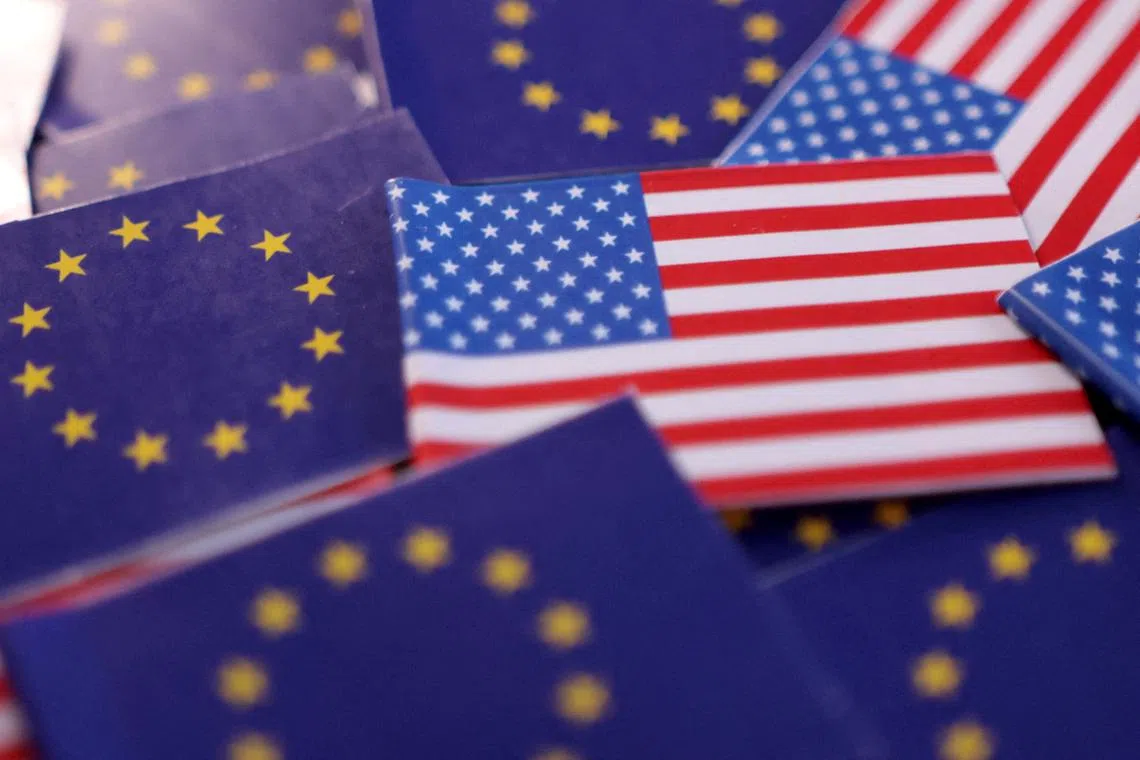 FILE PHOTO: U.S. and European Union flags are seen in this illustration taken March 20, 2025. REUTERS/Dado Ruvic/Illustration/File Photo