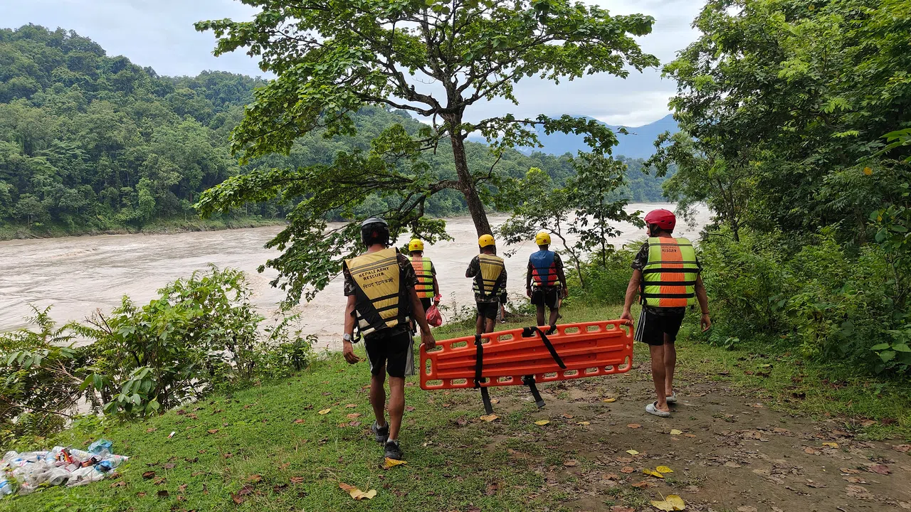 A team from the Nepali army on patrol along the bank of the Trishuli river in Chitwan district on Aug 31.
