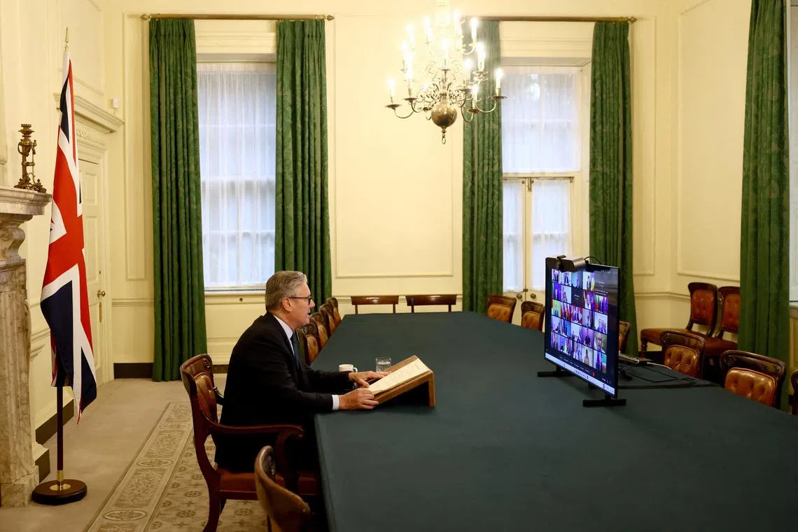 Britain's Prime Minister Keir Starmer co-chairs the Coalition of the Willing videoconference call with European leaders on Ukraine, ahead of the expected meeting of U.S. President Donald Trump and Russia's President Vladimir Putin in Alaska, in London, Britain, August 13, 2025. REUTERS/Jack Taylor/Pool